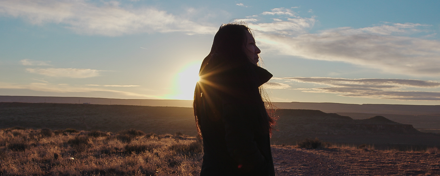 Hopi woman standing on Hopi land