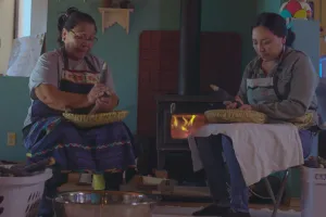 2 women and corn
