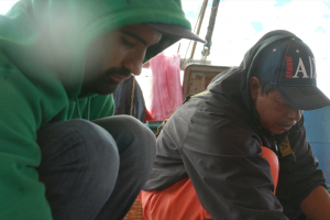 men on shrimping boat