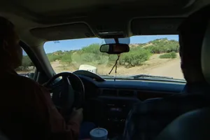 two men in a car